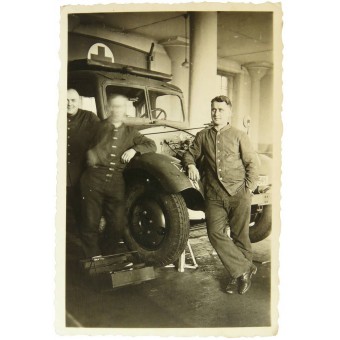 Wehrmacht ambulance car in the garage for repair. Espenlaub militaria